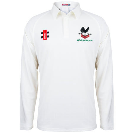 The Gray Nicolls Woolhope CC Matrix V2 Long Sleeve Match Shirt in white is made from 100% polyester, with the Woolhope C.C. logo on the left chest and a red and black patch with three black squares on the right chest.