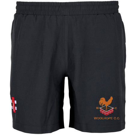 The Gray Nicolls Woolhope CC Velocity Training Shorts feature an elastic waistband, a red and white left thigh patch, and an orange rooster emblem with "WOOLHOPE C.C." on the right—ideal for cricket training with Woolhope CC.