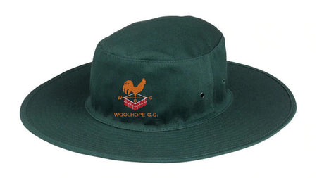 The Hunts County Woolhope CC Cricket Sunhat is dark green with a wide brim, featuring an orange rooster logo above red bricks and "WOOLHOPE CC" embroidered on the front.