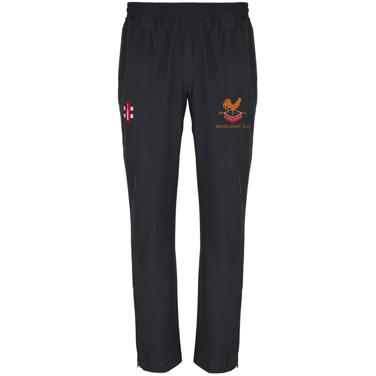 The Gray Nicolls Woolhope CC Velocity Track Trouser features an elastic waistband, athletic fit, an orange cricket club logo, and a small red and white emblem on the front, shown against a plain white background.
