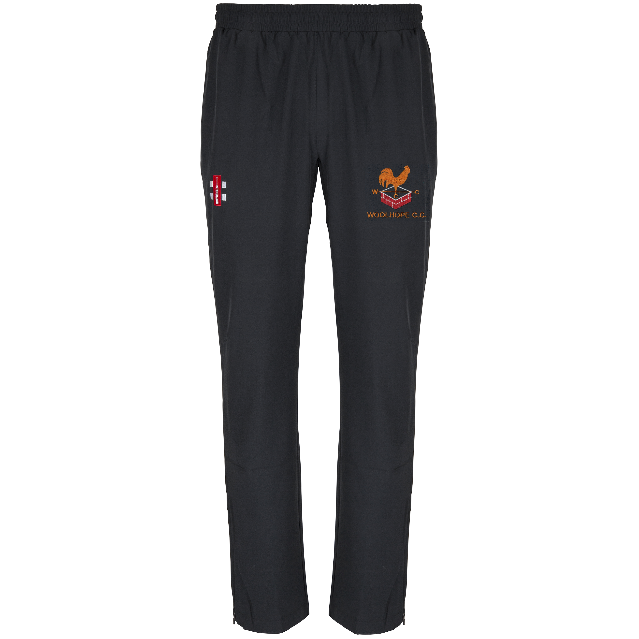The Gray Nicolls Woolhope CC Velocity Track Trouser features an elastic waistband, athletic fit, an orange cricket club logo, and a small red and white emblem on the front, shown against a plain white background.
