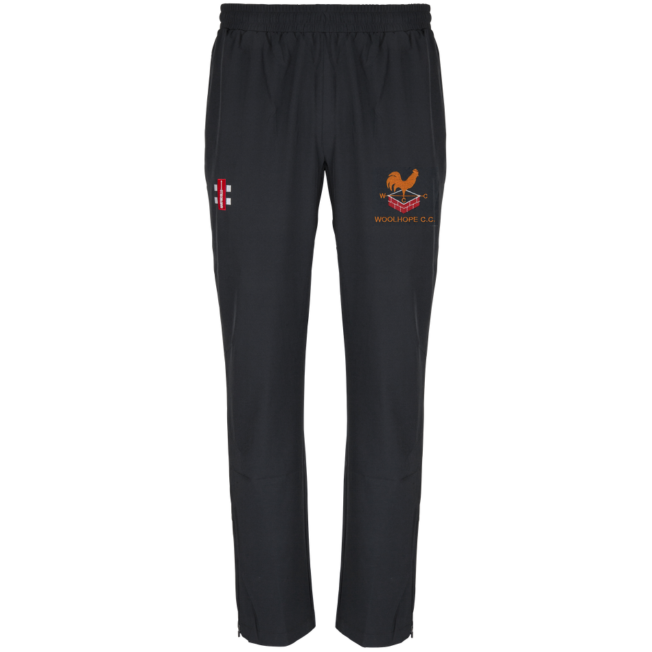 The Gray Nicolls Woolhope CC Velocity Track Trouser features an elastic waistband, athletic fit, an orange cricket club logo, and a small red and white emblem on the front, shown against a plain white background.