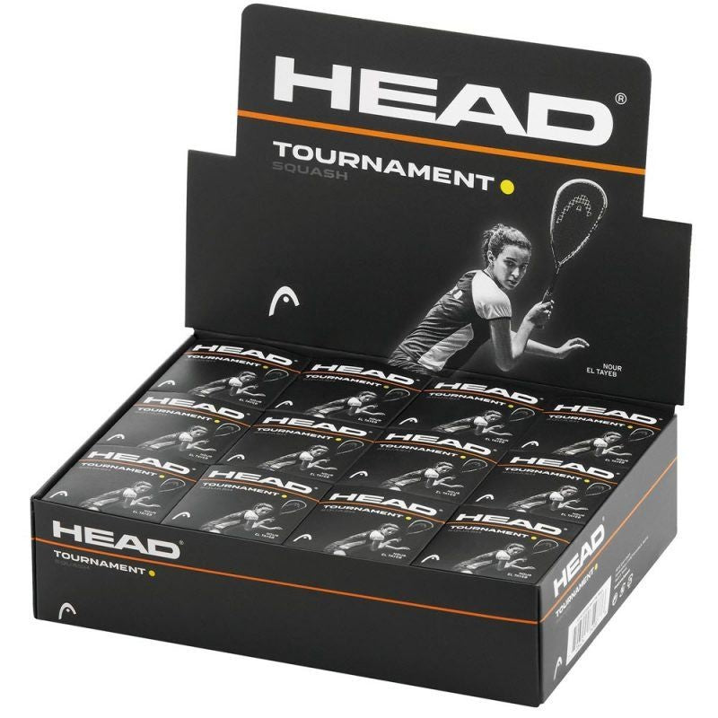 Open display box of Head Tournament Squash Balls - Single Yellow Dot (Box of 12) by Head, featuring packaging with a female squash player and prominent Head logo. Ideal for advanced players seeking yellow dot ball performance.