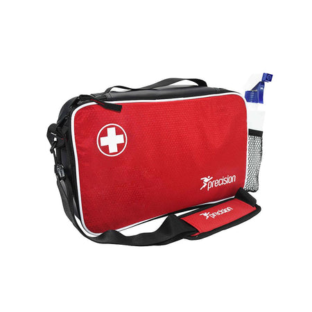 The Precision Training Pro HX Academy Medi Bag features a red design with a white medical cross, black shoulder strap, mesh side pocket for a blue spray bottle, and durable sports construction.