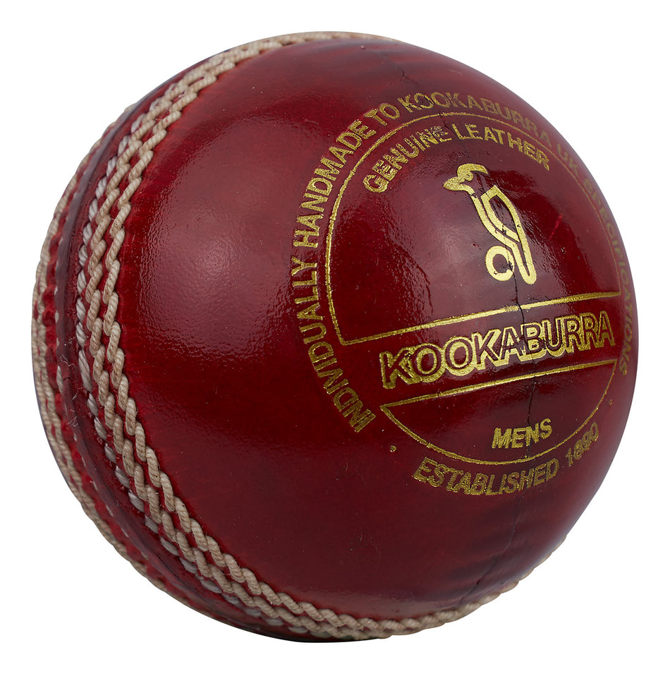 The Kookaburra County Special Cricket Ball features a shiny red surface, white stitching, gold branding text, and is hand-stitched from genuine leather—a premium men's cricket ball by Kookaburra.