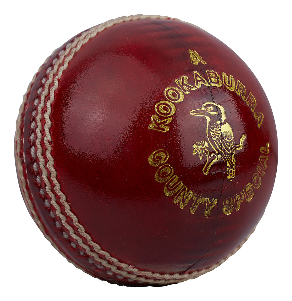 The Kookaburra County Special Cricket Ball by Kookaburra features red hand-stitched leather, raised seams, gold text, and a logo—ideal for those seeking a high-grade cricket ball.