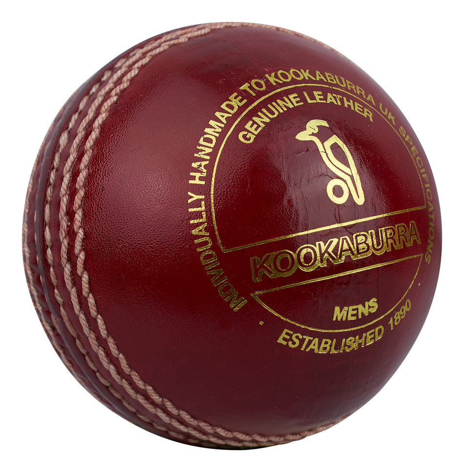 The Kookaburra County Club Cricket Ball in red leather features prominent white stitching, gold text ("Genuine Leather, Mens, Established 1890"), and a visible Kookaburra logo. This durable, hand-stitched ball is ideal for cricket players.