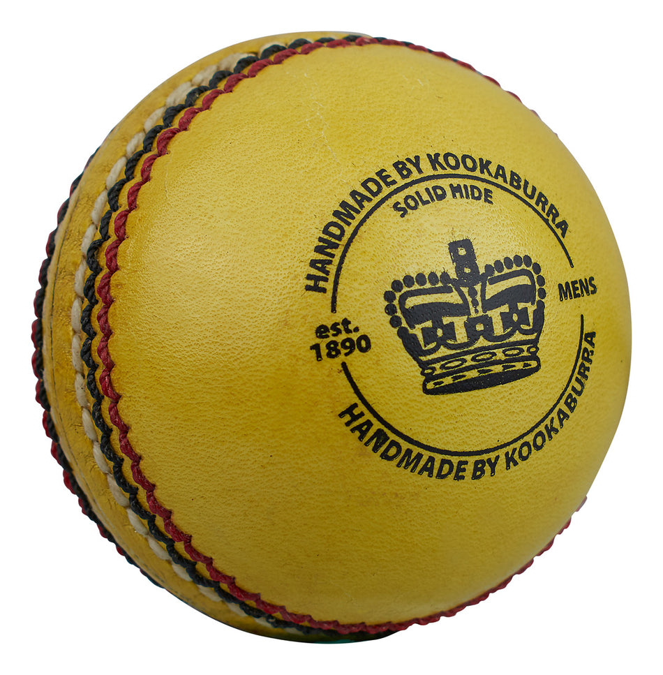 The Kookaburra Indoor Club Cricket Ball is yellow, features a stitched seam, black text including "HANDMADE BY KOOKABURRA", "SOLID HIDE", "MENS", and "est. 1890", with a crown logo on its solid hide leather surface.