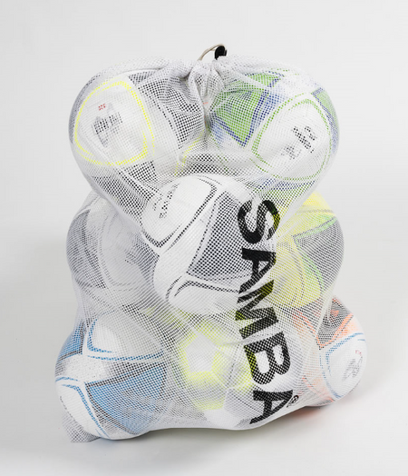 A Samba Sports Ball Net – Holds 10 balls, is shown filled with white soccer balls featuring colored accents. The word SAMBA is printed in bold black on the net. The background is plain white.