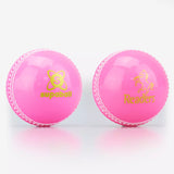 Two pink Readers Supaball cricket training balls with white stitching and horse logos are placed side by side on a white background, making them ideal options for coaching sessions.