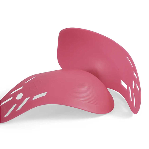 Two pink curved plastic Boob Armour Inserts by Boob Armour, featuring cut-out patterns, are overlapped on a white background. They serve as protective sports inserts for breast protection.