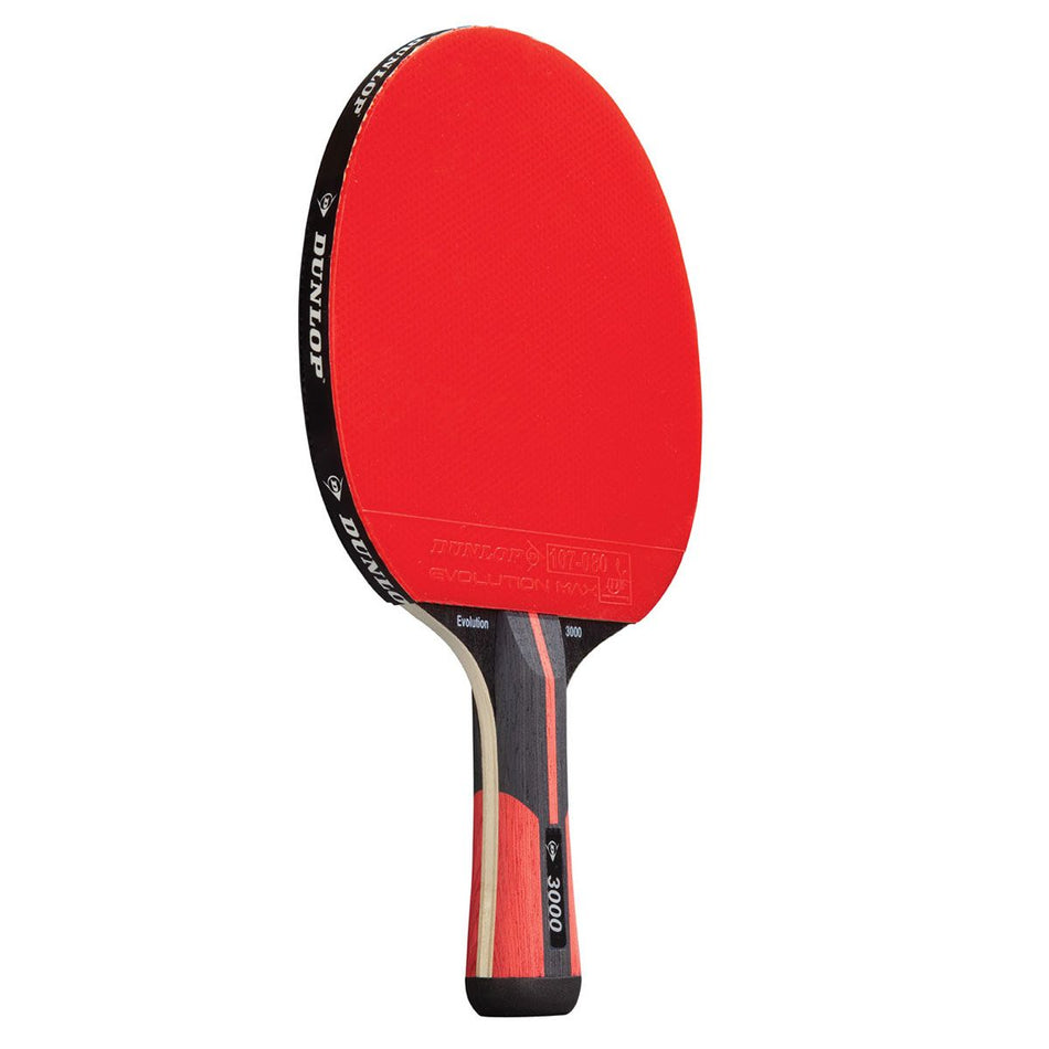 The Dunlop Evolution 3000 Table Tennis Bat features a red and black design, wooden handle, ITTF rubber with a textured red surface, model number 3000, and Dunlop branding along the edge.