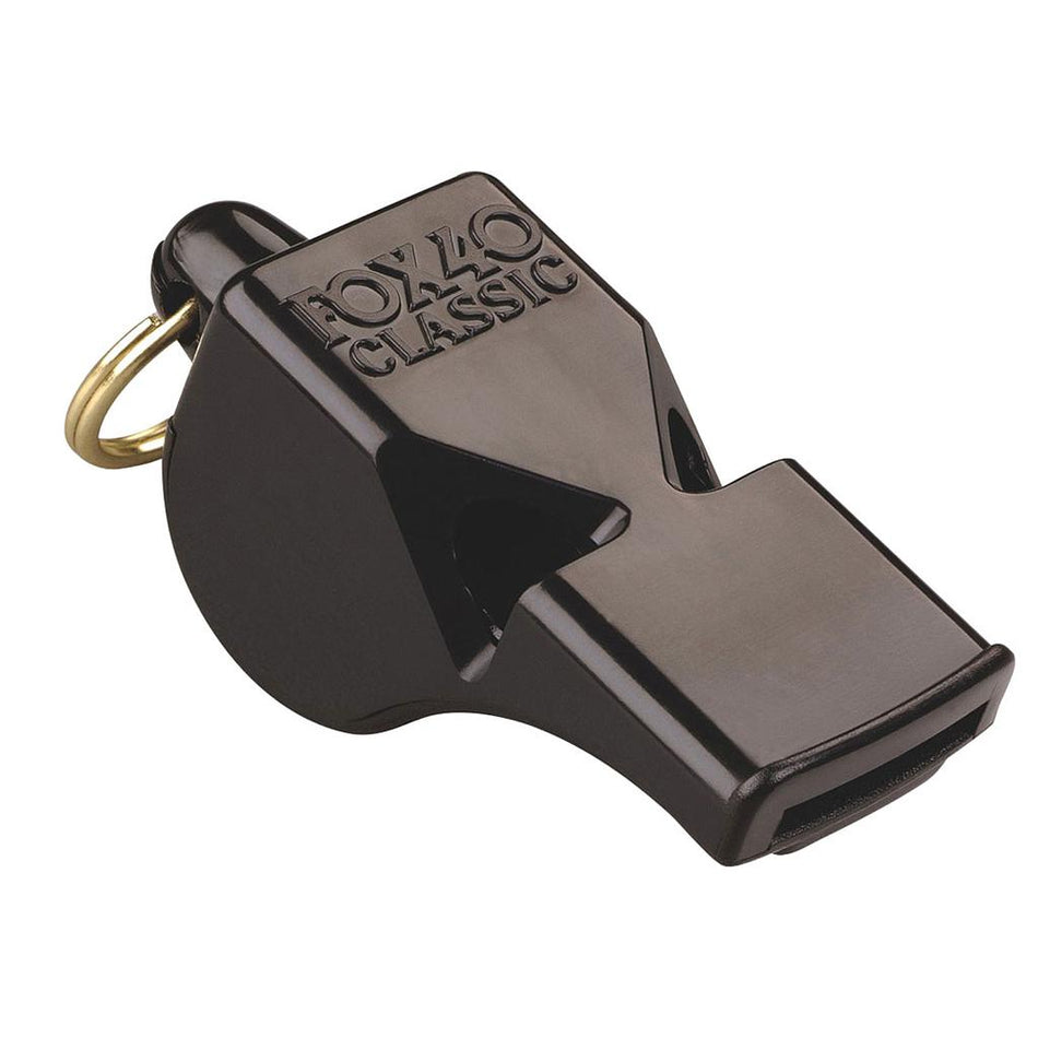 The Fox 40 Classic Official Whistle and Strap by Fox 40 is shown in black with a gold keyring, set against a white background. This pealess referee whistle produces a powerful 115 dB sound.