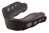 The Shock Doctor Gel Max Mouthguard in black features hexagonal side ventilation holes and textured upper padding, offering superior sports protection during physical activities.