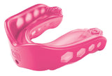 The Shock Doctor Gel Max Mouthguard in pink features hexagonal cutouts and textured inner surfaces, providing sports protection to keep teeth safe during athletic activities.