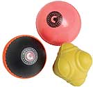 The Hunts County Skills Ball Set by Hunts County features three toys—a pink ball, a black and orange cricket training ball, and a yellow geometric toy—ideal for play, chewing, or introducing your pup to cricket training fun.