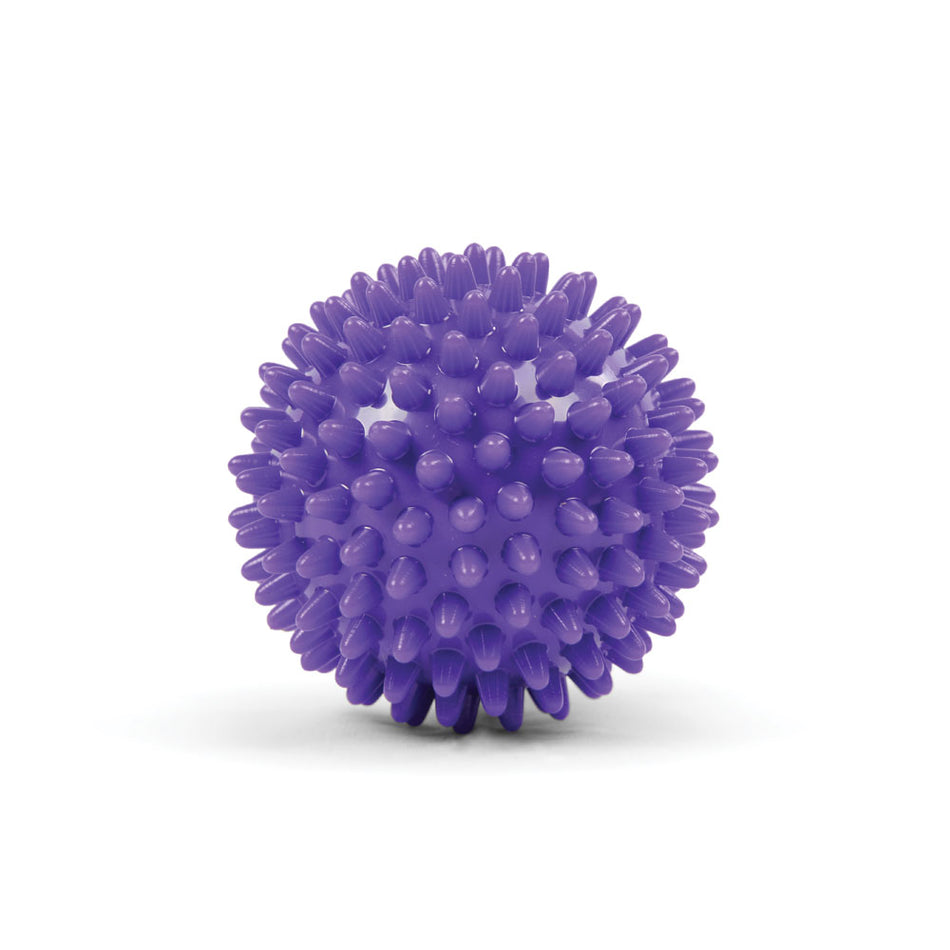 The Fitness Mad Massage Ball by Fitness Mad features evenly spaced short, rounded spikes for trigger point massage and effective muscle release. Shown here in purple on a white background.