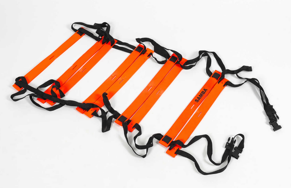 A Samba Sports 4m Speed Ladder with orange fixed rungs and non-slip black straps is laid out flat on a white surface. The word "SAMBA" appears on one of the rungs.