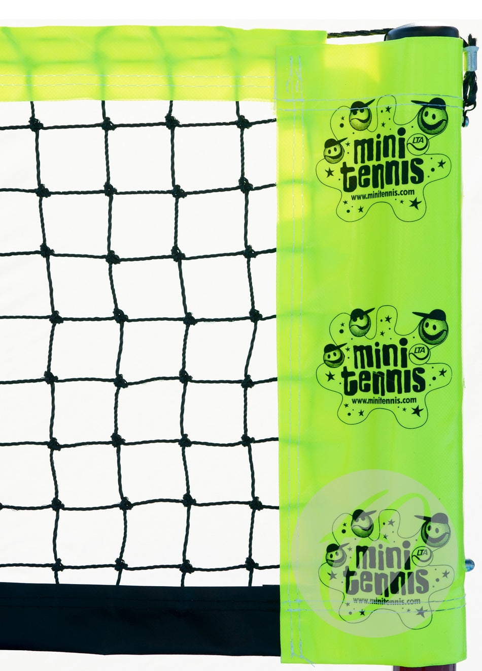 A close-up of the Harrod Sport Wheelaway Mini Tennis Posts - Replacement Net shows a black net with a yellow-green strap labeled "mini tennis" in black, featuring cartoon faces and stars. The strap is attached to the 0.86m-high net, highlighting its fun design.