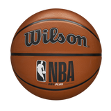 The Wilson NBA DRV Plus Basketball by Wilson, featuring a performance cover with the NBA logo and DRY PLUS text, is shown on a white background.