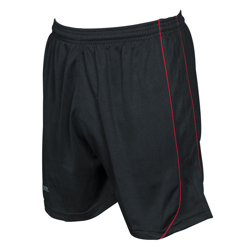 Precision Training Precision Mestalla Shorts in black feature an elasticated waistband and a slim red side stripe. Made from lightweight polyester sports fabric, these athletic shorts are shown on a white background.