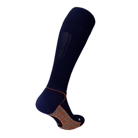 The Precision Training Precision Pro Grip Football Socks Junior is shown in navy blue with orange and white sole patterns against a white background. It features grip soles and ribbed sections at the top and ankle for football boot support.