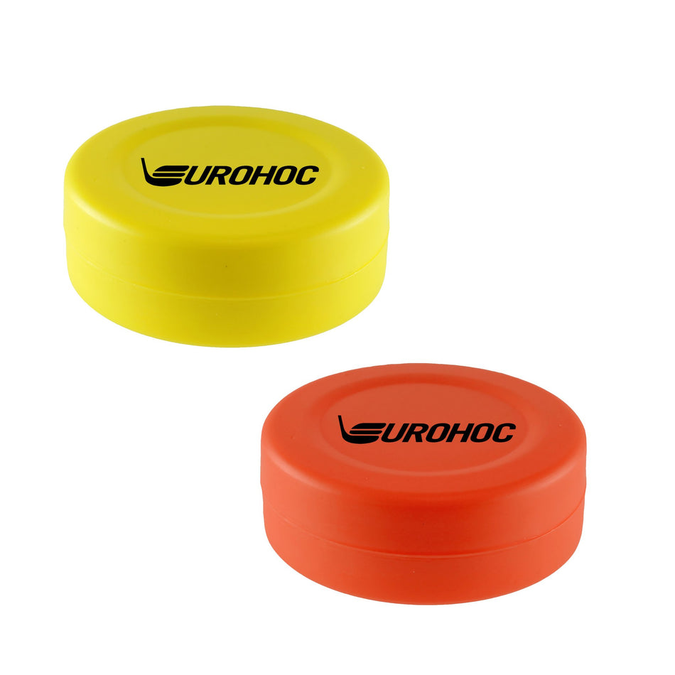 The Eurohoc Floorball Puck by Eurohoc is a lightweight, round, orange puck with the black Eurohoc logo on top. The high-visibility puck is shown placed on a white background.