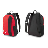 Front and back views of the Puma Team Goal 23 Backpack—a red and black Puma bag with adjustable straps, side mesh pockets, two-way zip, and white logo, offering both style and function for sports use.