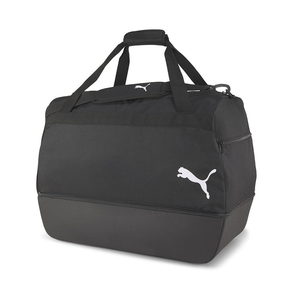 The Puma Team Goal 23 Teambag features a black design with a white Puma logo, modern style, dual carry handles, shoulder strap, zippered main compartment, structured bottom panel, and a dedicated boot compartment.