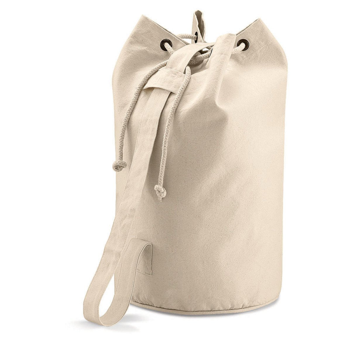 The Quadra Duffle Style Ball Sack is a durable beige canvas bag with drawstring closure, metal grommets, and a single shoulder strap—ideal for carrying balls. It stands upright against a white background.