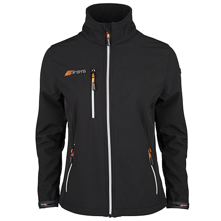 The Grays Ladies Radius Soft Shell Jacket is a black, breathable, water-resistant jacket featuring orange accents, white zippers, three zippered pockets, an upright collar, and the Grays logo on the chest.