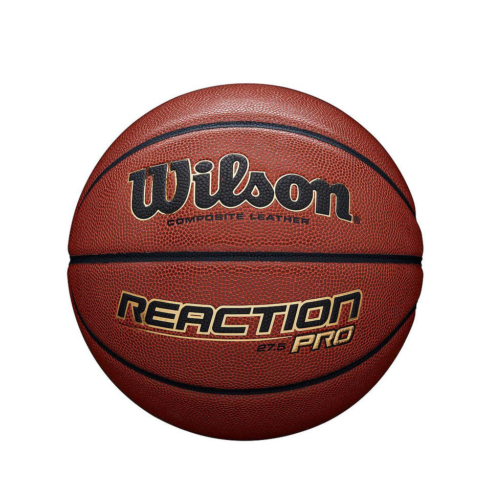 The Wilson Reaction Pro Basketball by Wilson features a composite cover, standard pebble texture, and black and gold branding. Designed for indoor/outdoor play, it is shown photographed against a white background.
