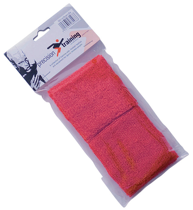 A packaged pair of red cotton Precision Wristbands by Precision Training, displayed in a clear plastic bag with a branded header—ideal for training sessions.