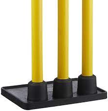 The Hunts County Reflex Flexi Practice Stumps feature three yellow stumps with black rubber bases on a rectangular black platform, ideal for coaching and training sessions.
