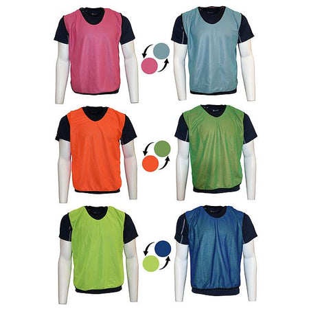 Six mannequins wear Precision Training Reversible Mesh Training Bibs in Yellow/Royal over black shirts. Arrows highlight their reversible feature for versatile use on the field.
