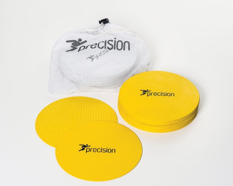 A set of 20 Precision Training Round Rubber Marker Discs with non-slip backing sits beside a white mesh carry bag, both labeled “precision,” on a white background—ideal for sports training and drills.