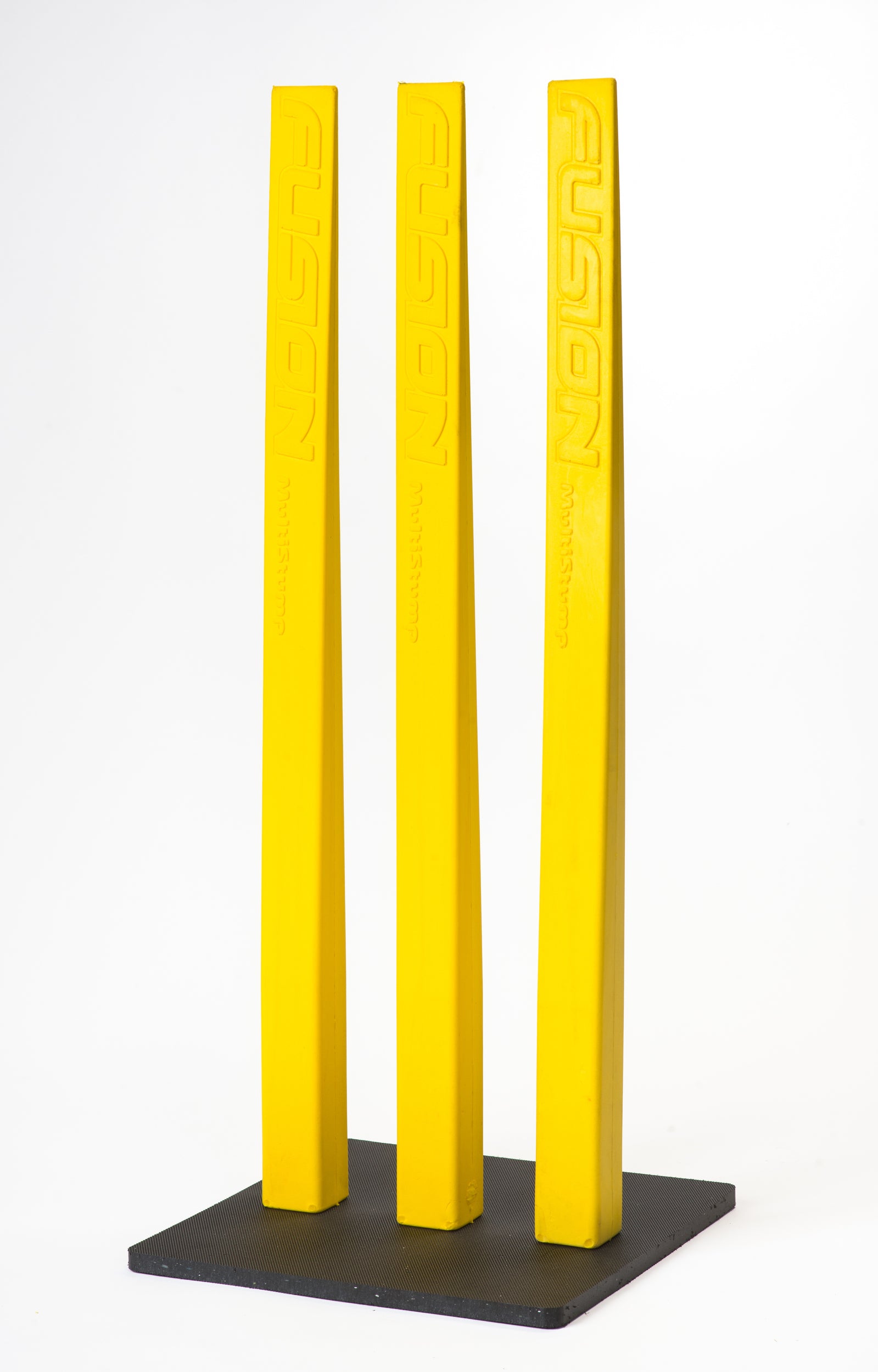 Three bright yellow Fusion Multi-Stump All Weather Base stumps, each embossed with "FUSION," stand upright on their durable base—perfect for hard wicket cricket—set against a plain white background.