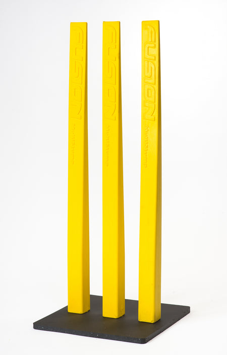 Three bright yellow Fusion Multi-Stump All Weather Base stumps, each embossed with "FUSION," stand upright on their durable base—perfect for hard wicket cricket—set against a plain white background.