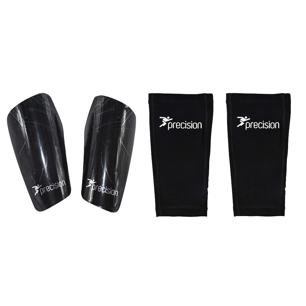 The Precision Training Pro Matrix Shinguards in black, shown with two matching compression sleeves featuring the white Precision logo, provide an anatomical fit and superior protection for every player.