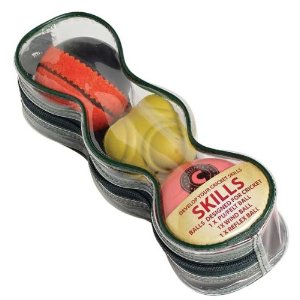 A transparent, peanut-shaped zippered pouch from Hunts County holds a Skills Ball Set—red, yellow, and white balls for versatile cricket training. The label reads "Skills" and lists the ball types inside.