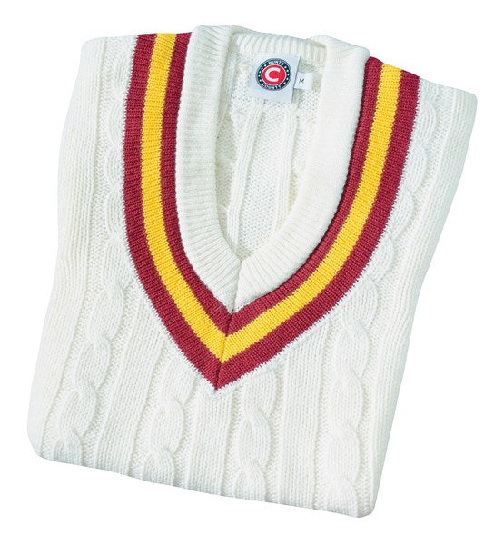 The Hunts County Trimmed Cricket Slipover is a folded white V-neck sweater with red and yellow collar stripes, adding classic style to your wardrobe.