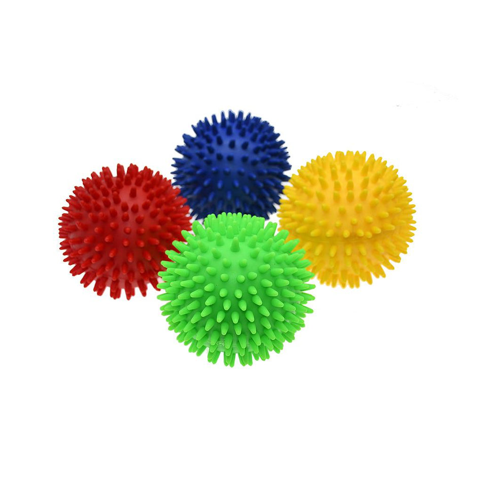 The Reydon Sports Soft Touch Spike Ball set includes four soft vinyl balls in red, blue, yellow, and green—perfect for sensory awareness and comfortable to touch.
