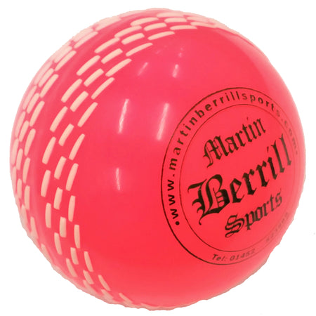 A vibrant pink ball from the Martin Berrill Sports Skill Ball Set features white dashes and “Martin Berrill Sports” printed in black on its surface.