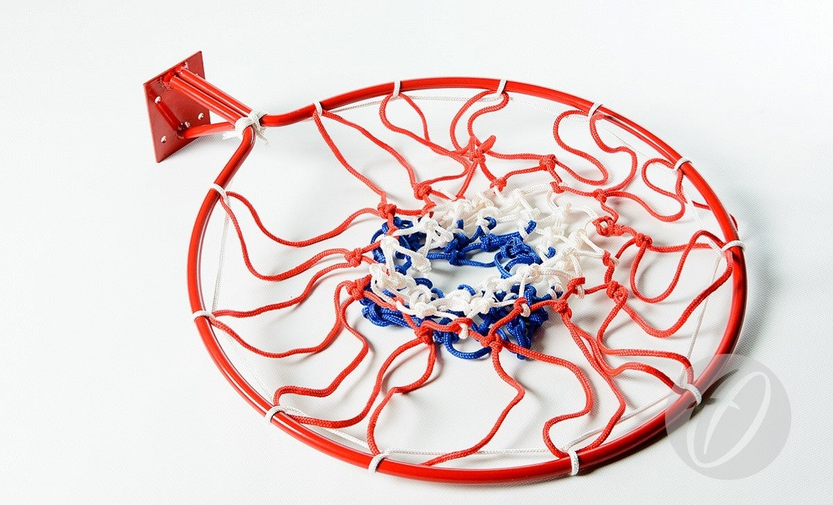 The Harrod Sport Tricolour Basketball Nets, featuring a red metal hoop and a red, white, and blue braided net, rest flat on a white surface. The wall or backboard mounting base plate is visible on the left.