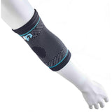 The Reydon Sports Ultimate Performance Ultimate Compression Elastic Elbow Support, in black and gray with turquoise accents, features breathable four-way stretch fabric and targeted circular elbow padding, worn on a mannequin's arm above and below the elbow.