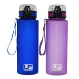 Two Urban Fitness Flow Flip Lid Water Bottles 700ml—one blue, one purple—with flip lids, carrying straps, easy flow mouthpieces, and the Urban Fitness logo near the base.
