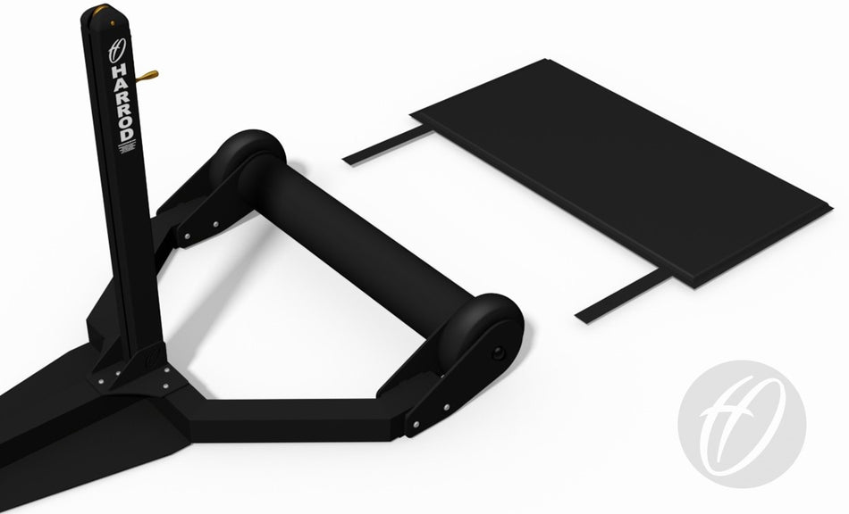 A Self Weighted Wheelaway Tennis Posts - Base Protection Pad by Harrod Sport is shown in black with wheels, next to a flat rectangular panel with two strips. Made from high density foam and reinforced PVC, a circular logo appears in the bottom right.