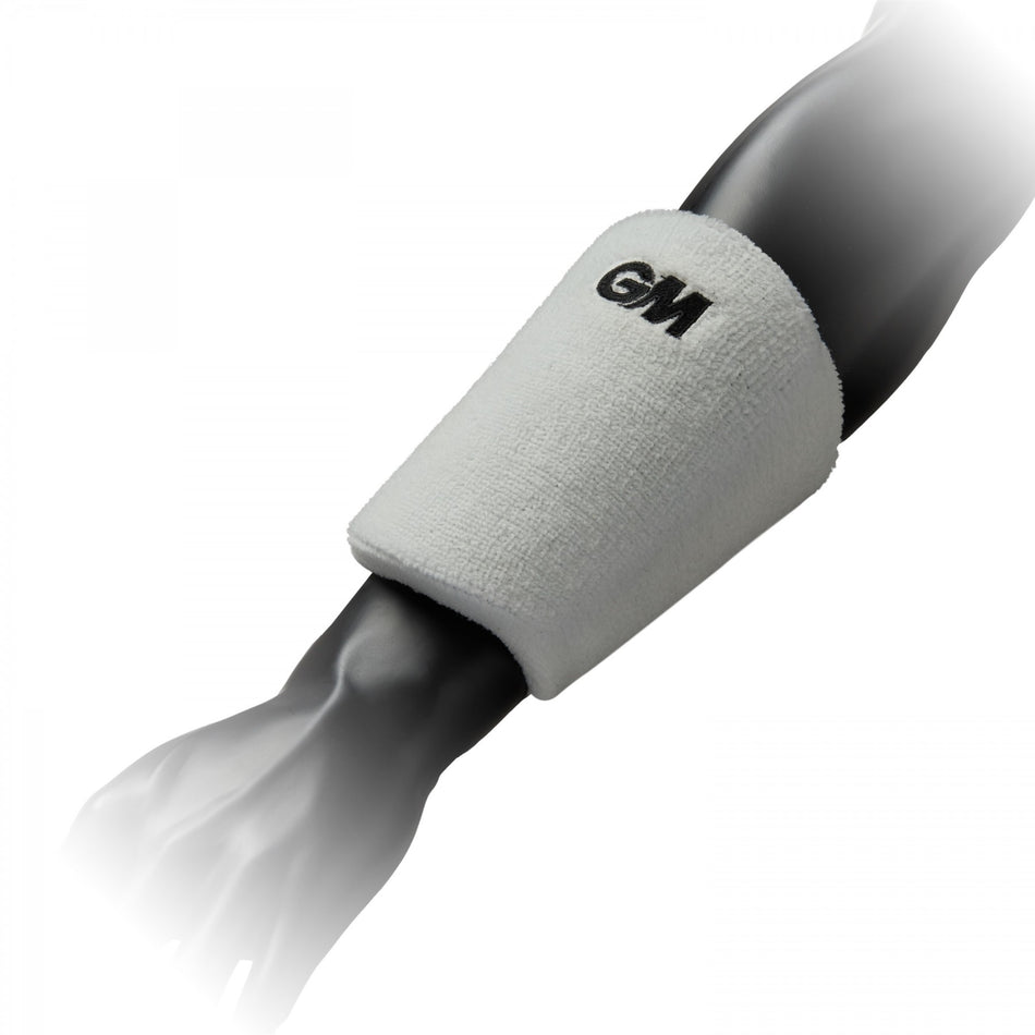 The Gunn & Moore Players Wrist Guard, in white with black GM lettering, is displayed on a mannequin arm and provides professional forearm and wrist protection.